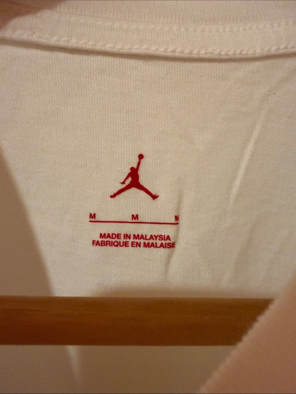 Jordan White Short Sleeve Tee with Black and Orange Logo